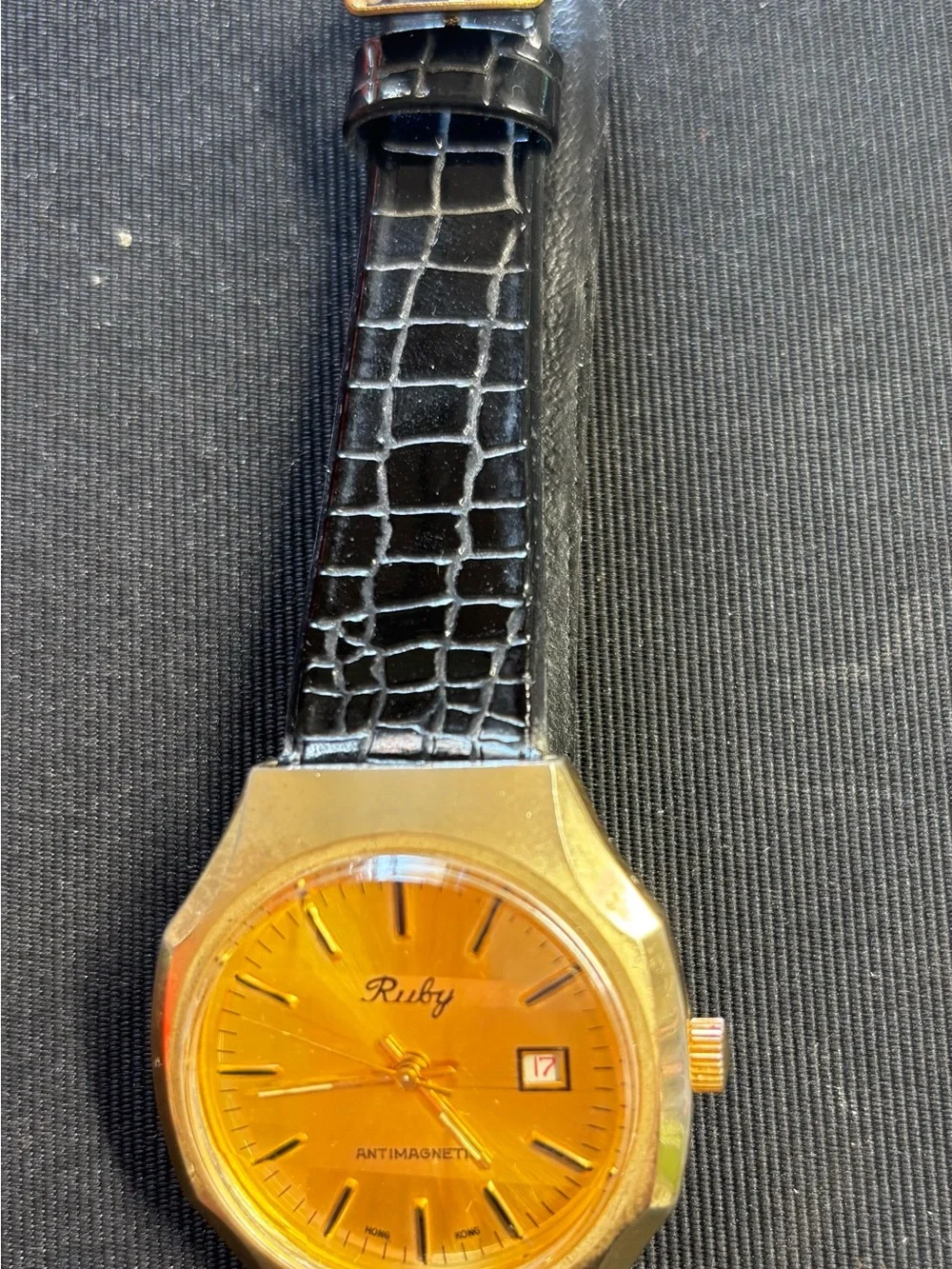 Gold-Tone Watch with Black Leather Strap